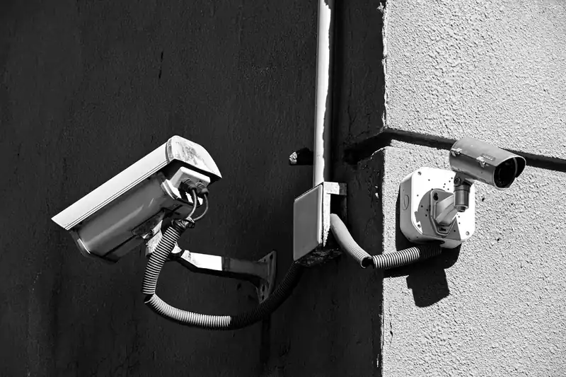 Bullet security cameras installed on an exterior wall
